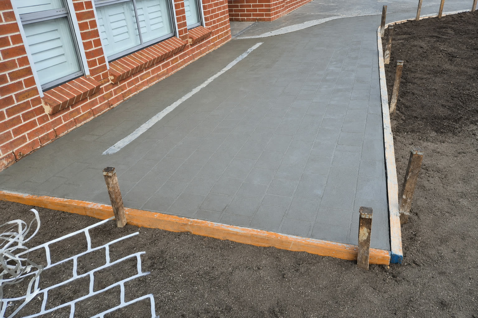 Brick-pattern concrete path, Sydney property