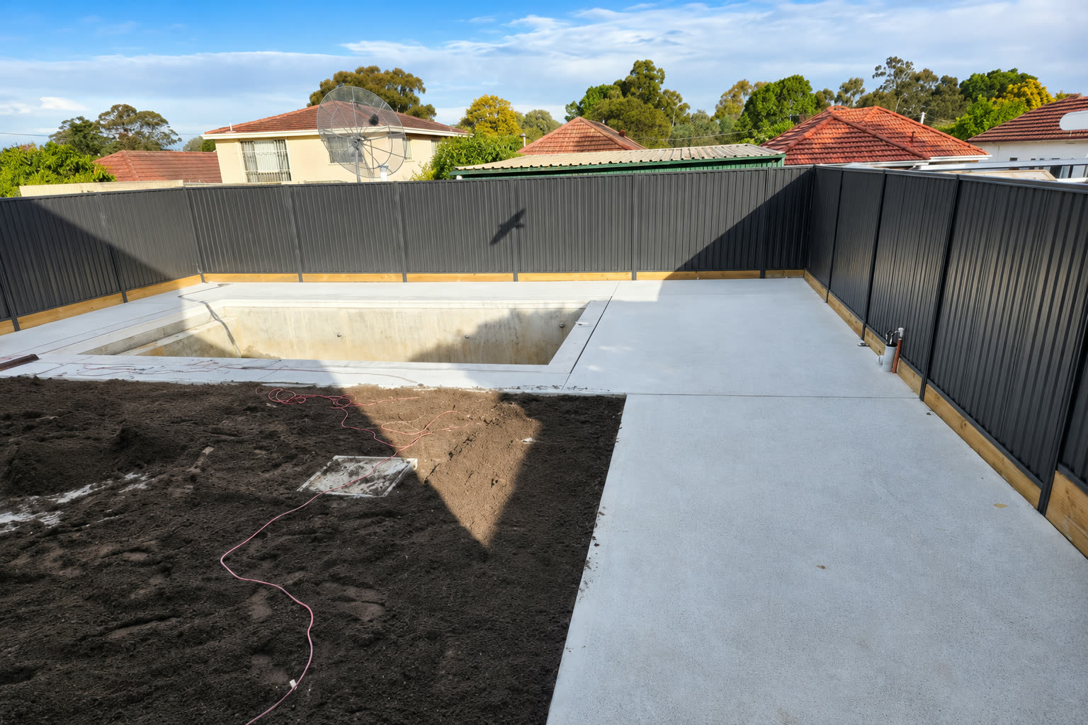 Concrete slab poured around an in-ground pool