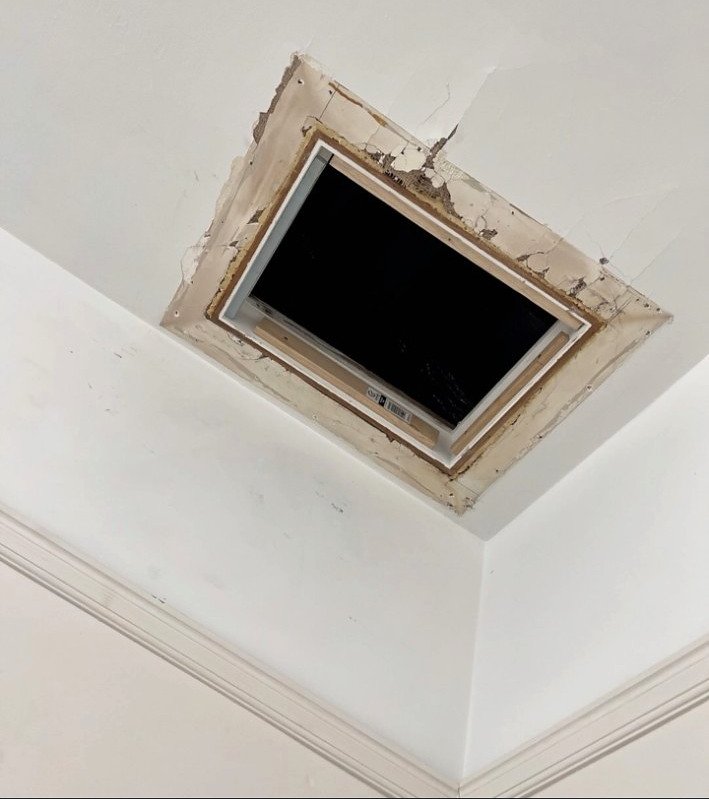 Ceiling access hatch before repair