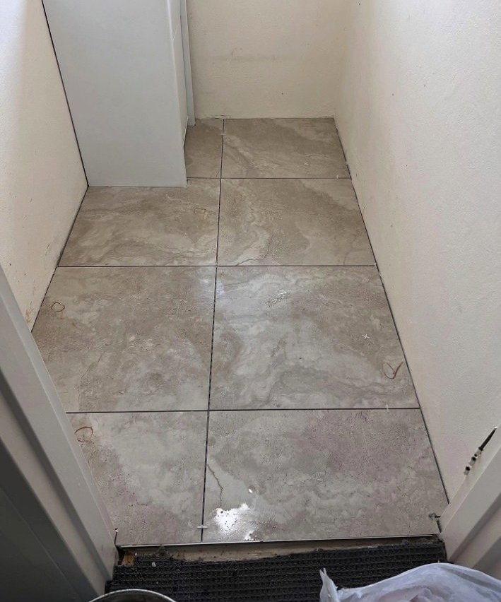 Finished laundry floor tiling