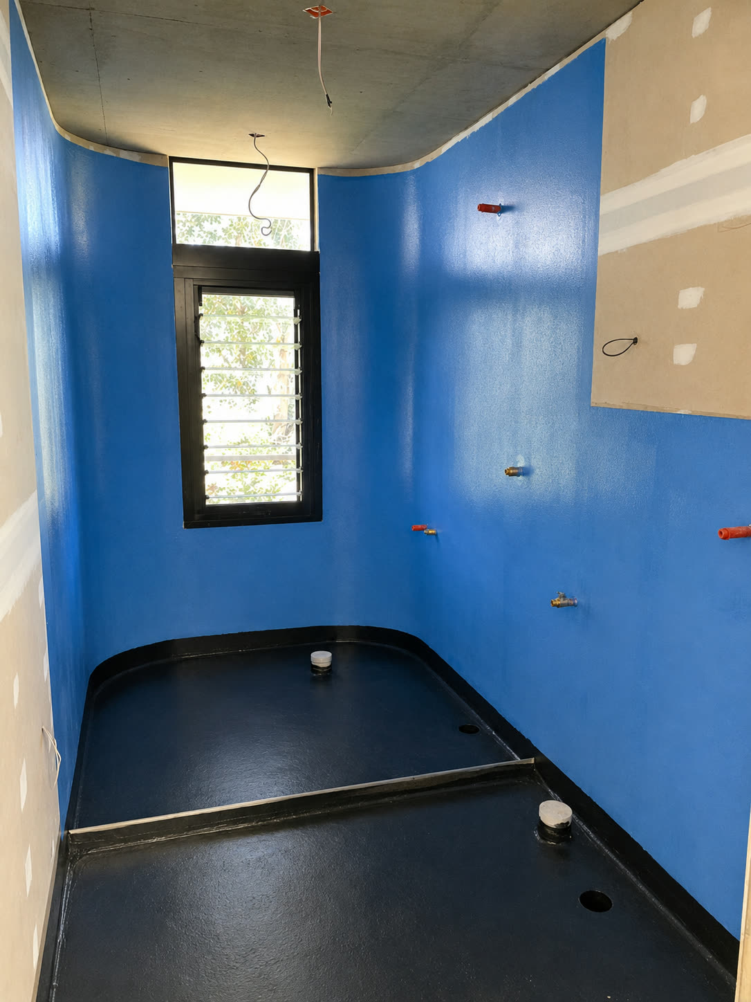 Wet area waterproofing membrane application